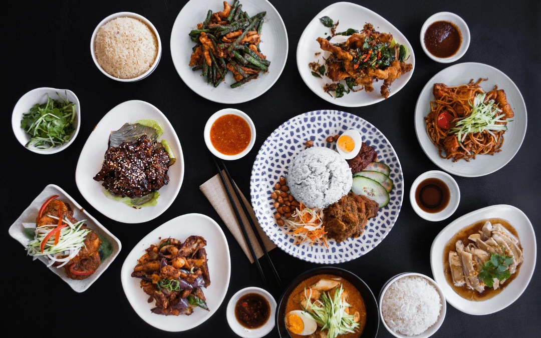 Many Different Types Of Asian Dish On Black Background