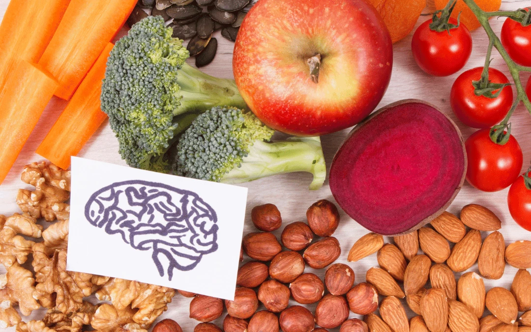 Fruits And Vegetables And Nuts Flatlay On Table With Drawing Of Brain